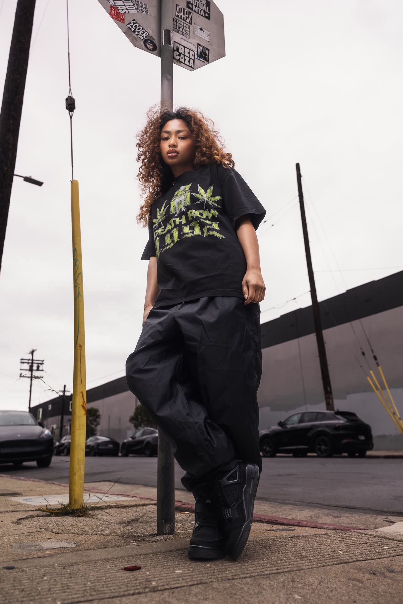 BLV creator talent modeling a streetwear look on location