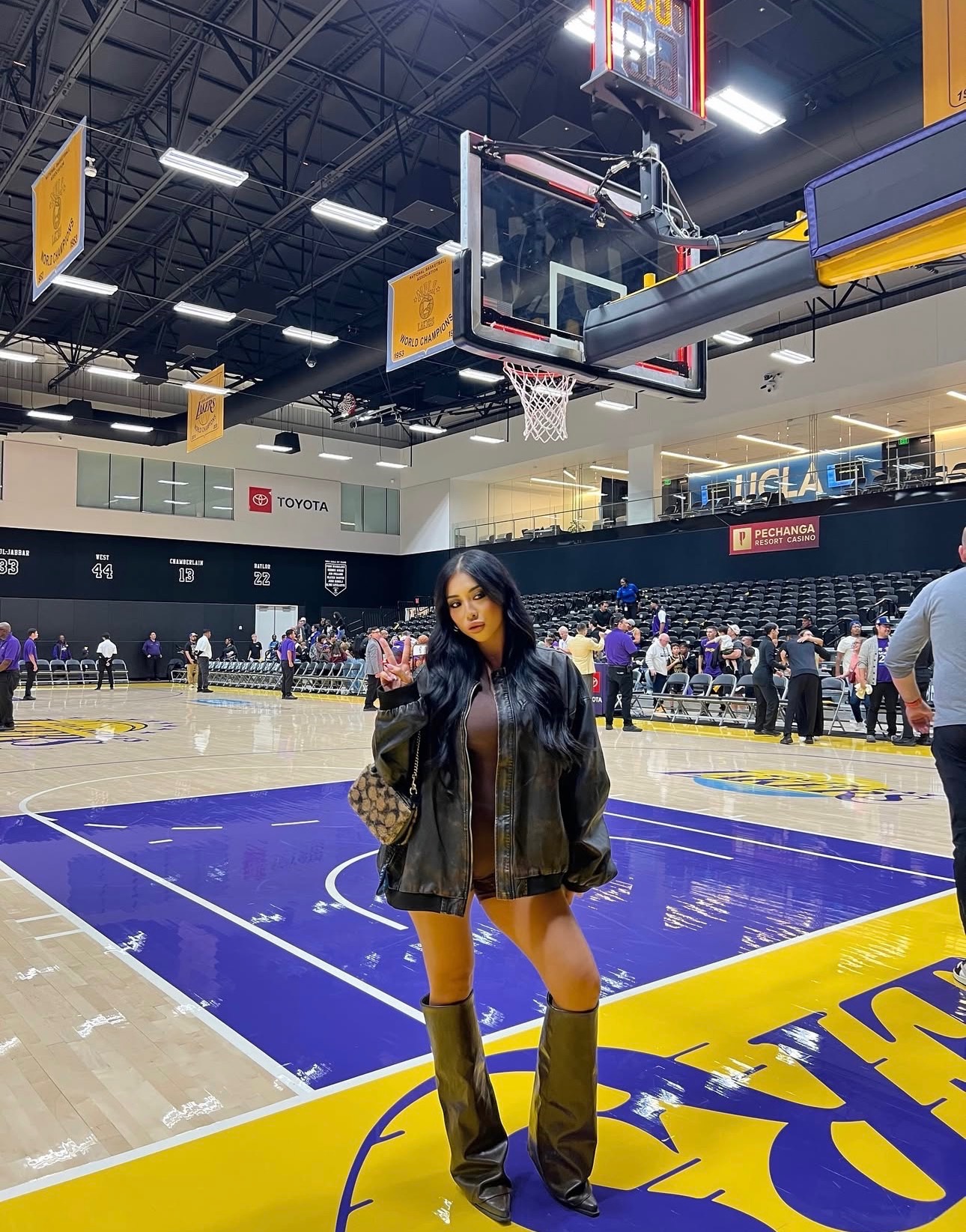 BLV talent on the court at a Los Angeles Lakers event