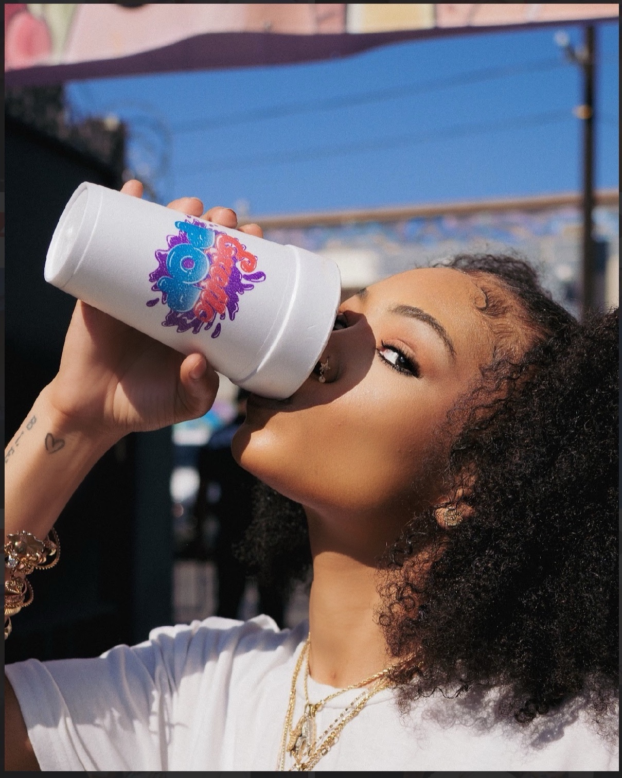 BLV event talent with a branded product