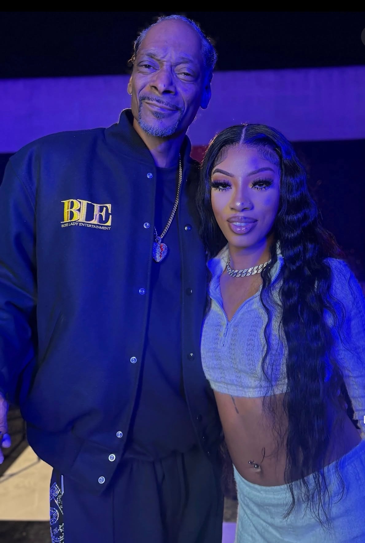 Snoop Dogg with BLV talent at an event